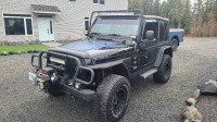 2004 Jeep Wrangler, 5 speed standard, 6 cyl, air conditioning