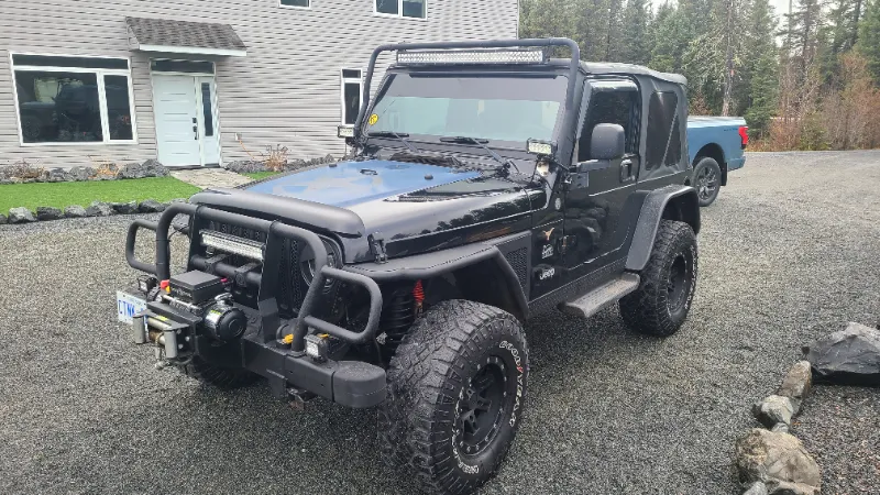 2004 Jeep Wrangler, 5 speed standard, 6 cyl, air conditioning