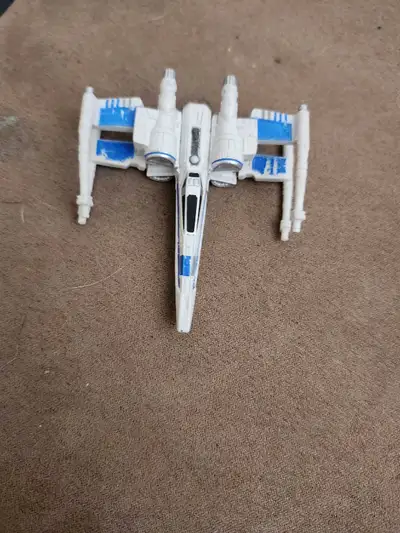 Relive the excitement of Star Wars with this vintage X-Wing fighter, a must-have for collectors and...