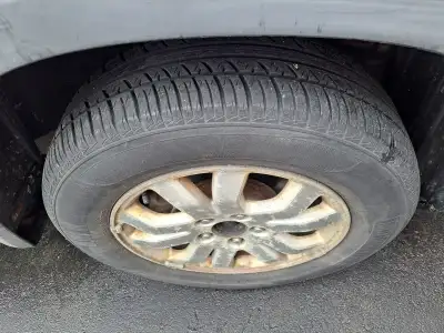 Four 215 65 R16 alloy rims with tire. Tires may be for another one season. Price $160 for four rims.