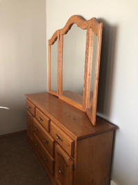 Solid oak dresser with mirror. 