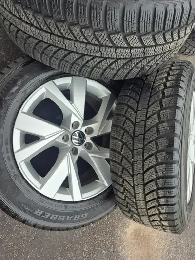 245/60/R18 vw oem wheels and General winter tires. Bolton pattern is 5x112. Came off Atals. Fits all...