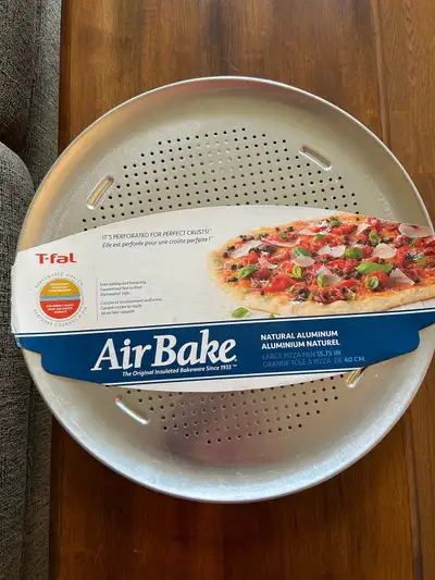 Perforated for perfect crusts, this good quality pizza pan is large 15.75”. Air bake for even baking...