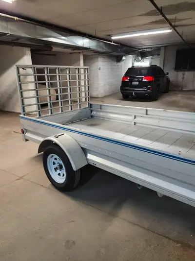 2024 sterling utility trailer. All galvanized. Never rust 6x10. Rear ramp. Front gate also folds dow...