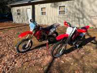 Father and Son's Honda bikes.  2007 crf230f and 2014 crf450x