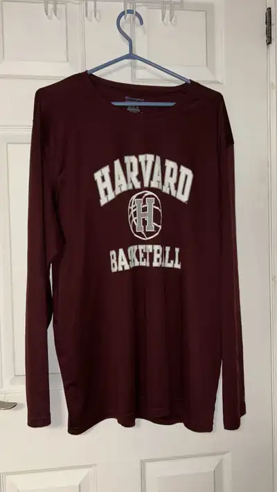 Harvard University Basketball Champion brand jersey is in like-new condition and ready for a new fan...