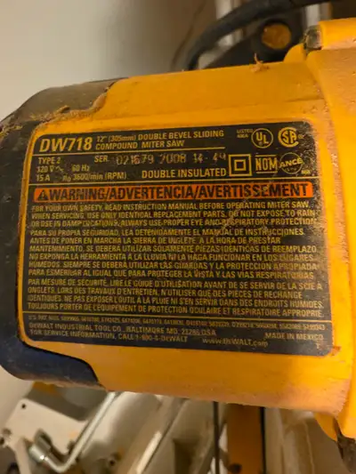 DeWalt 15 amp. dual bevel 12 inch-sliding compound mitre saw. Original stand included. Always stored...