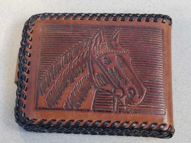 Classic handmade leather Western wallet.