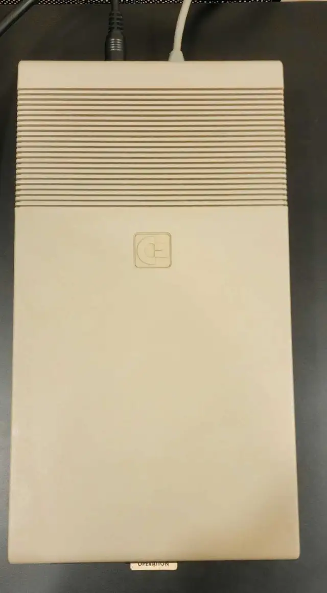 Commodore floppy disk drive 1541 with box and floppy disks in Other in Calgary - Image 4