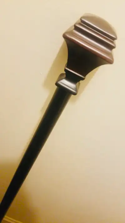 3 curtain rods. Each can be adjusted to fit in windows. Asking $40 for all 3