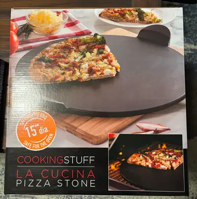 15" Pizza stone Can use on BBQ or Oven Perfect condition Selling for $15 OBO Pick up Meadowvale Ad w...