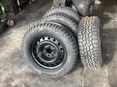 Nokian Outpost nAT AT all weather tires mounted on 20-inch steel rims Used only about 4 months, went...