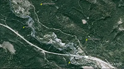 Germansen River placer claim. Old hydraulic pit from the 1930s. Deep ancient deposit. Mining shut do...