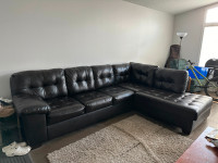 Black Leather Sectional sofa- like new