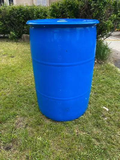 Barely used 55 gallon drum in good condition. Includes both threaded bung caps. Note: it has two sma...
