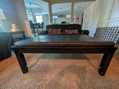 Used coffee table with side pull outs for extra space.