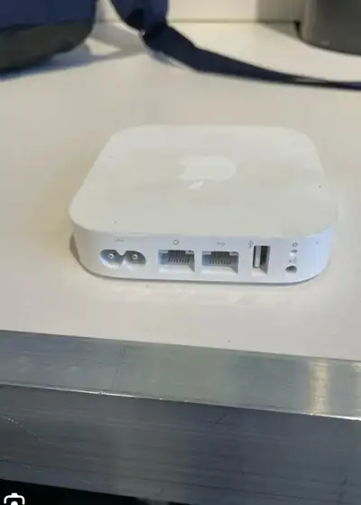 Apple TV box Apple AirPort Express See pictures for more details Thank you