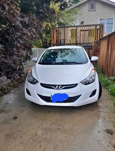 Looking to sell my reliable 2013 Hyundai Elantra, a sleek sedan that offers both comfort and efficie...