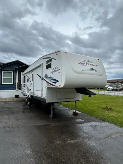 -3 way fridge and hot water tank (Propane , 12 volt, 120 v) - Air conditioning (works very well) - F...