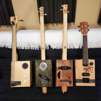 Collection of 4 Cigar Box Guitars