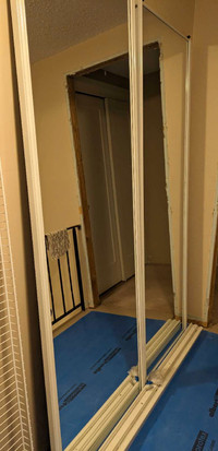 Mirrored sliding closet doors
