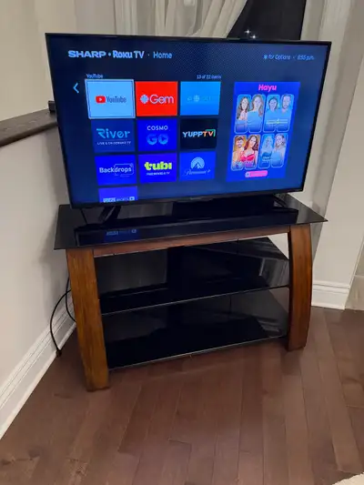 Sharp TV and Stand $275/obo, View more