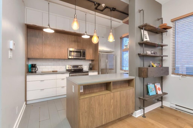 St‑Henri Modern 2BR Condo + Indoor Parking + Huge Balcon — photo 1