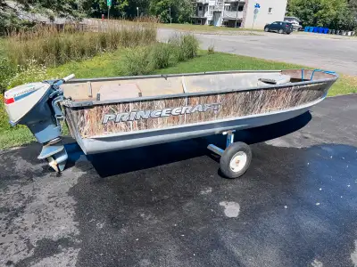 14 feet princecraft boat with a camo wrap + Working 9.5 Evinrude. I will send video No trailer but c...