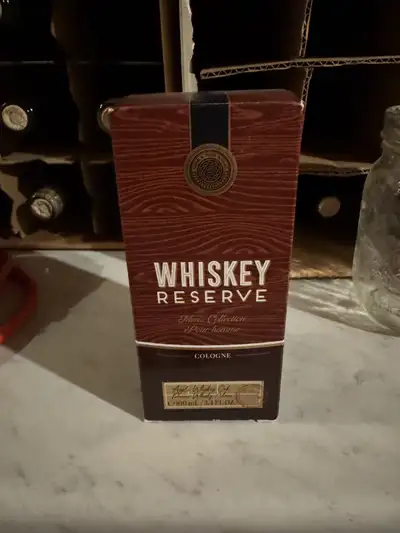 This is a 100 ml bottle of Bath & Body Works Whiskey Reserve Cologne for men, blending notes of cris...