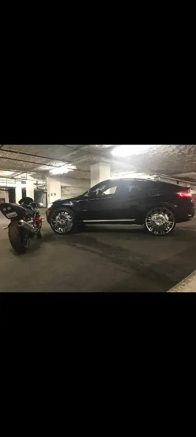 Pirelli tire 28 inches custom made fits BMW X6 with spacers and bolts $8k or best offer. Custom made...