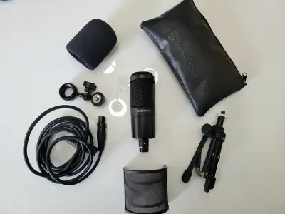 Selling my Audio‑Technica AT2020 condenser microphone in like‑new condition. Video of angle of mic a...