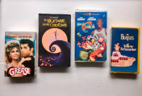4 Classic VHS video tapes Grease, Nightmare, Space Jam, Beatles
