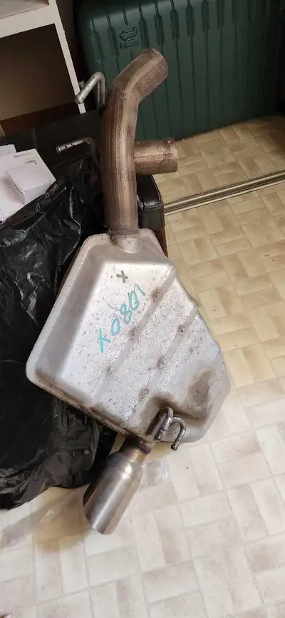 Two mufflers off of a 2011 Camaro SS. Had 35,000km when removed. Never seen winter.