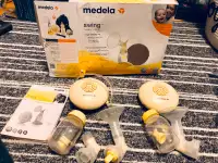 2 sets of Medela Swing electric automatic voldemort breast pumps