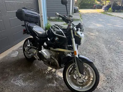 2009, 84,000kms, black with white pin strips, factory hard bags, trunk, tank bag, heated grips. Exce...