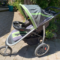 Baby stroller by Graco.