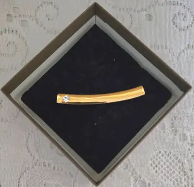 ELEGANT GOLD-TONE CURVED PIN WITH FAUX DIAMOND, View more