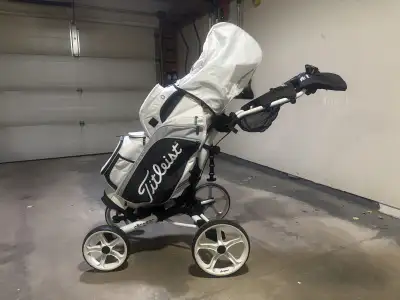 Clicgear Model 8+ four wheel golf push cart and Titleist Cart 15 golf bag for sale. Used for one ful...
