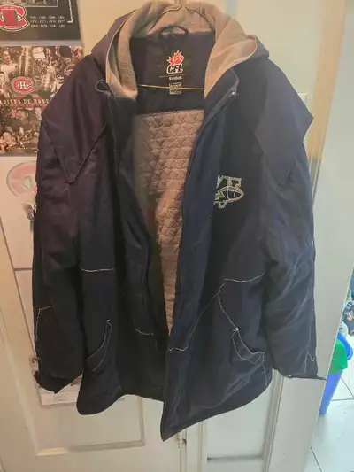 Stay warm and show your team spirit with this CFL Winnipeg Blue Bombers jacket, perfect for die-hard...