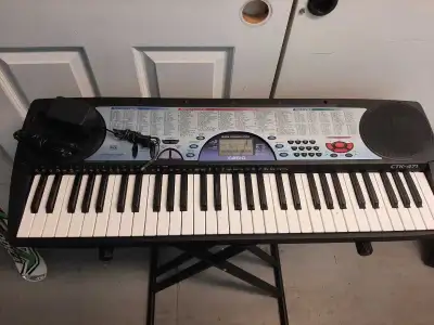 Casio CTK-471 keyboard *with power supply, no stand*, View more