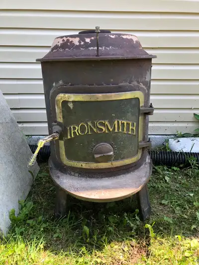 iron smith wood stove, View more