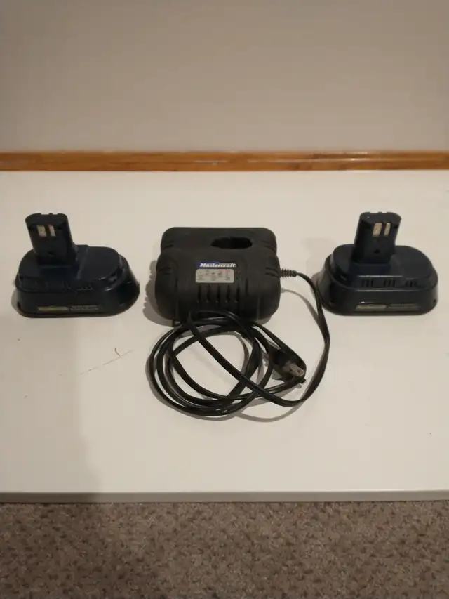 Pair of 14.4 Volt Mastercraft Ni-Cad Batteries and a One Hour62863735717122125