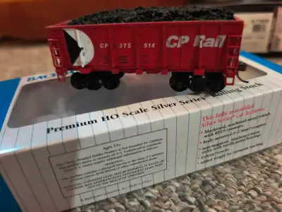 HO Bachmann Silver Series ore car with load and light weathering. I installed the load, which may re...