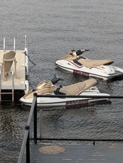 2 ' 99 seadoo gtx's, run good 200 hrs , nice double trailer,rear seats need to be recovered, located...