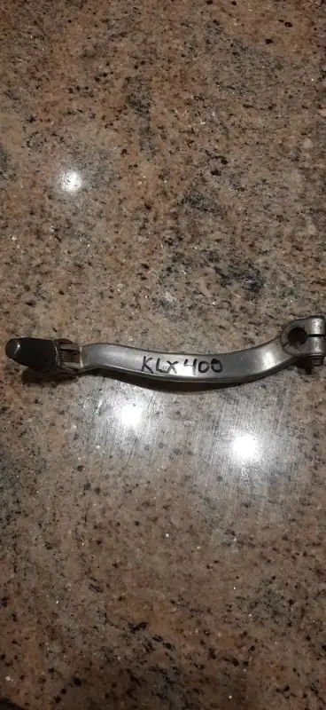 Spare gear selector I bought for my 2003 KLX400. Put away and forgotten about. Will eventually need...