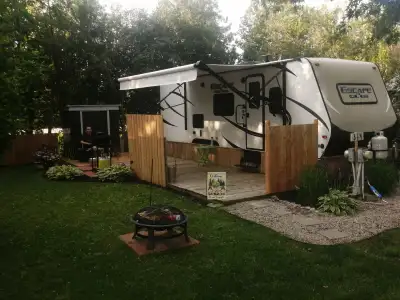 POSTING FOR A FAMILY MEMBER. Well maintained and very clean 27' 2019 KZ RV Escape trailer with 1 sli...