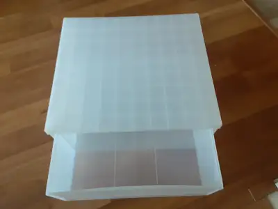 Lid flips over and has compartments to hold screws, crafts , beads Measures 19 in wide by 18 inch by...