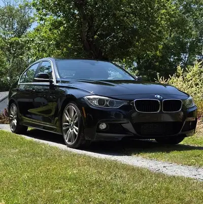 2015 BMW 335i x-drive M Sport 6 speed manual. Metallic black with black Dakota leather interior. App...
