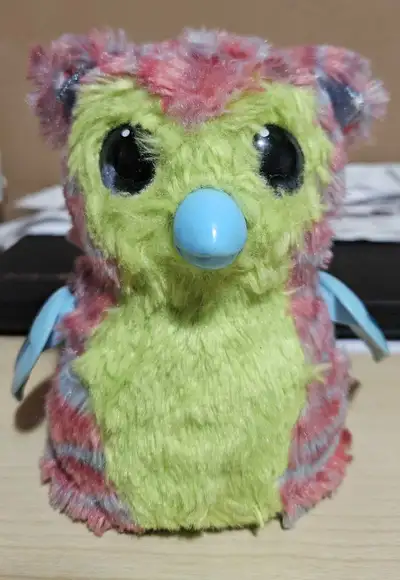 Green and Pink Furry Toy, View more