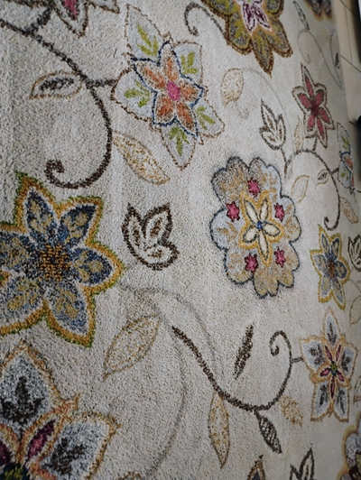 2 matching Malibu design wool rugs from a non-smoking and no pet household. Rugs have large print wi...